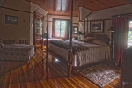 bedroom with bed and chair